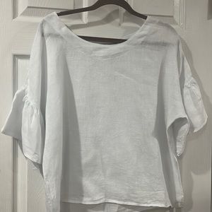 White linen shirt with flared sleeves